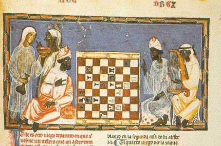 Moorish dignitaries playing chess in Spain. Beside them, two maids – a white lady and a black one – and a black musician. 1283; Source: the Golden age of the Moor, Ivan van Sertima, page 29